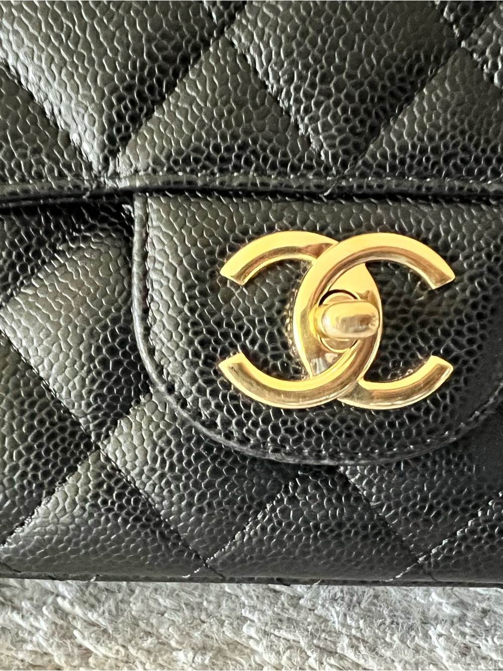 CHANEL Black Quilted Caviar Maxi Flap Bag with Gold CC Turnlock